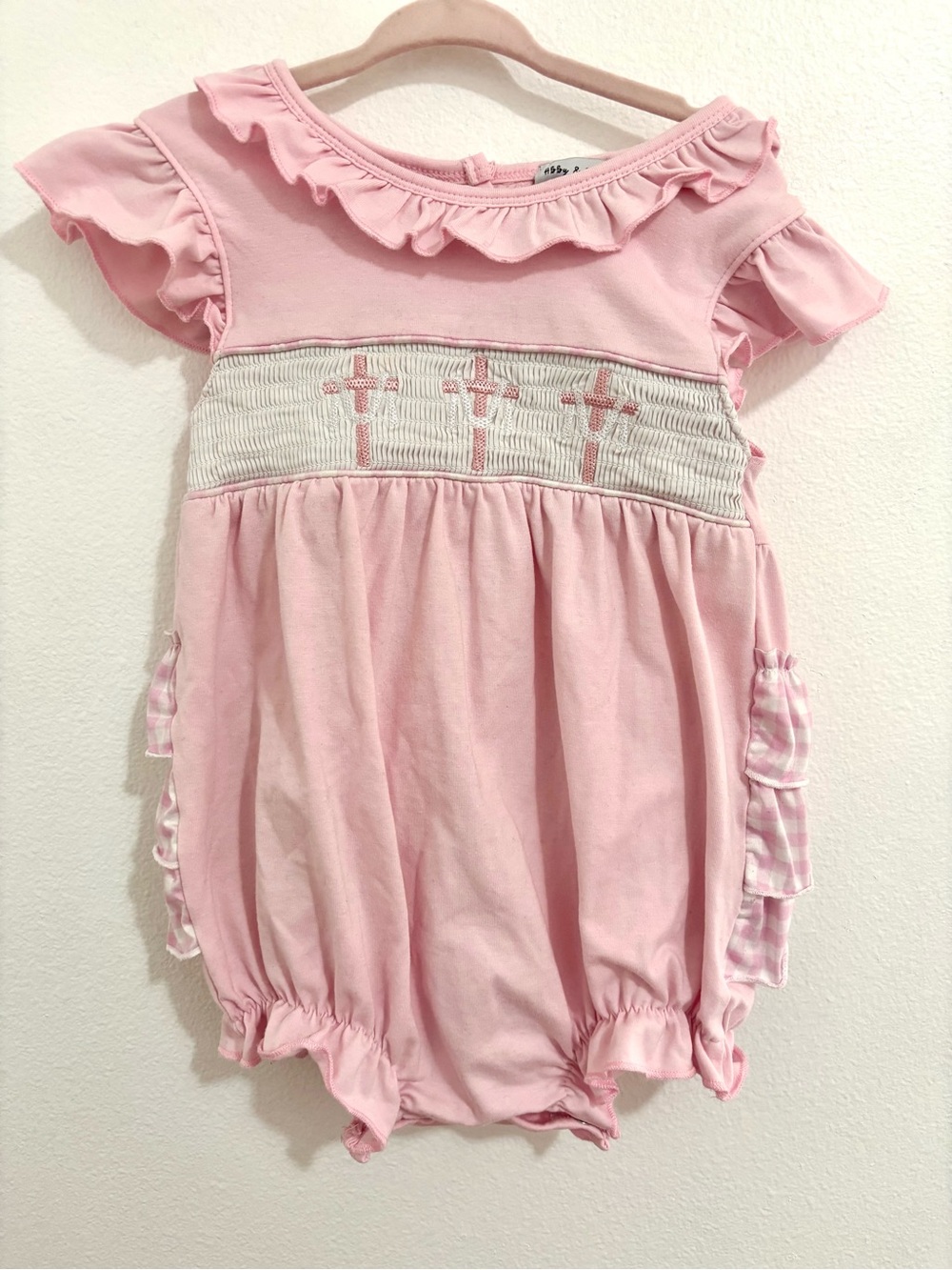 Pink Ruffle Baby bubble with Smocked Cross Detail